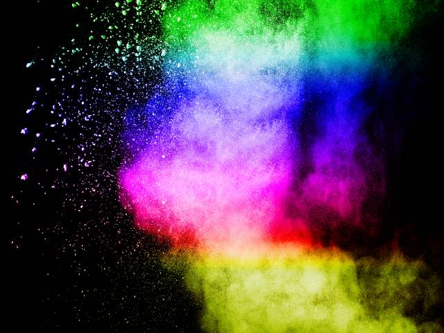 Έκρηξη σκόνης χρωμάτων RGB σε μαύρο φόντο και ένα σύννεφο πανδαισίας χρωμάτων.